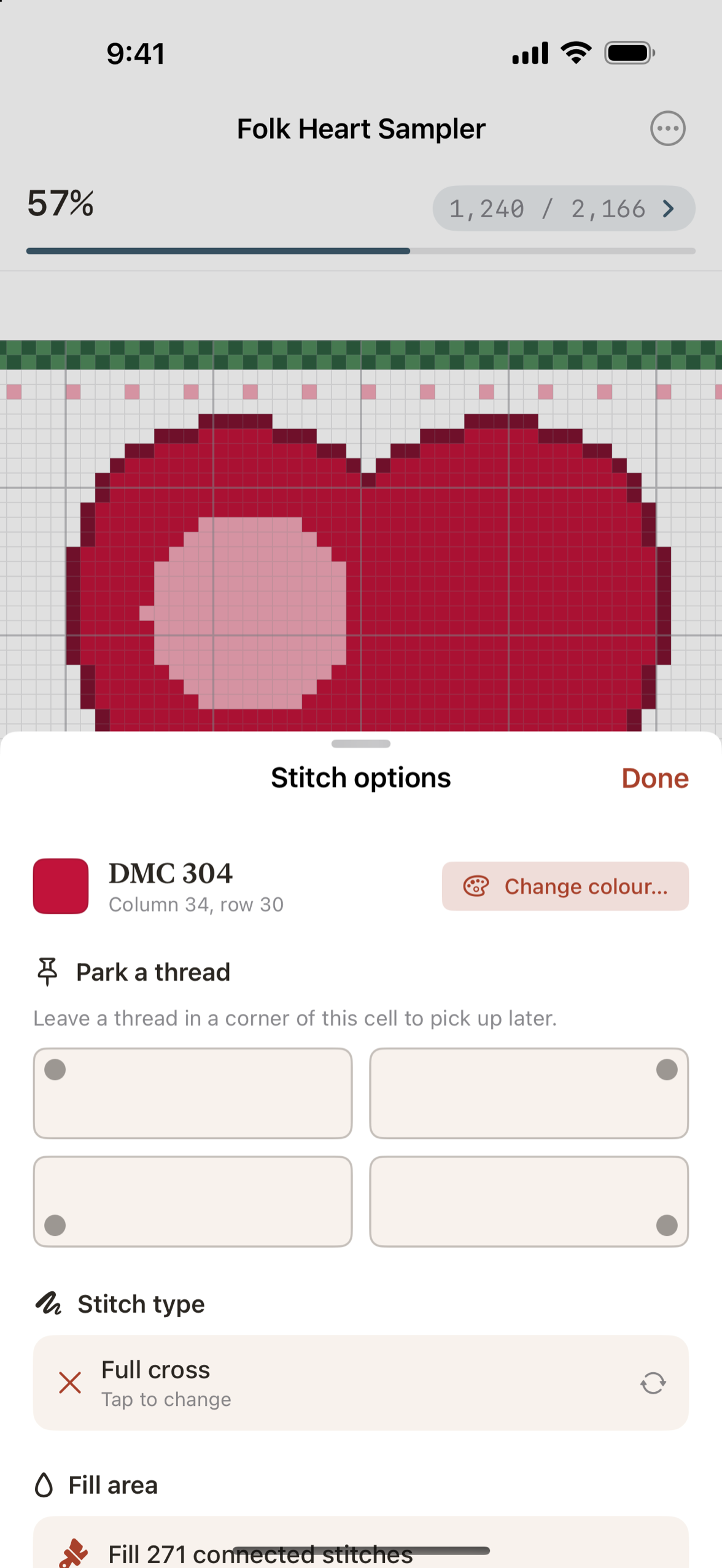 The stitch options menu over a chart: park a thread in a corner, change the stitch type, fill an area or fix the chart itself.